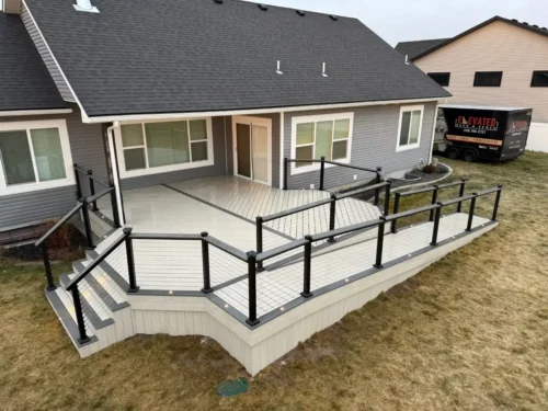 Modern custom deck build in Rigby, ID with Trex composite decking.