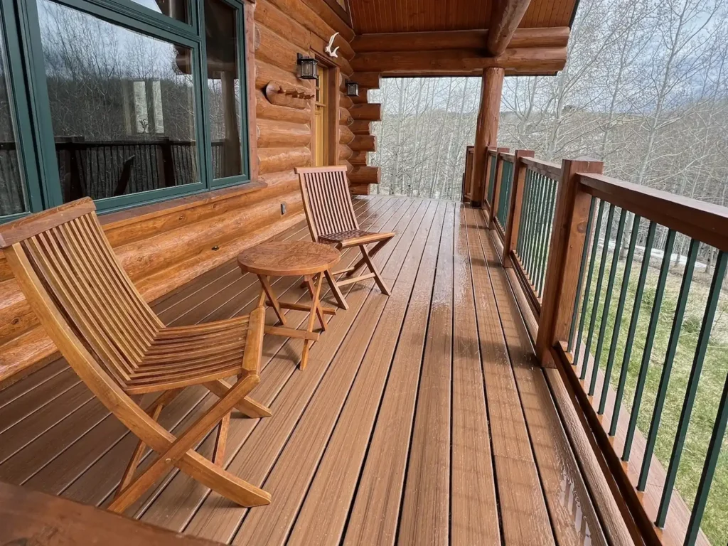 Deck with railing on a log home in Tetonia, ID